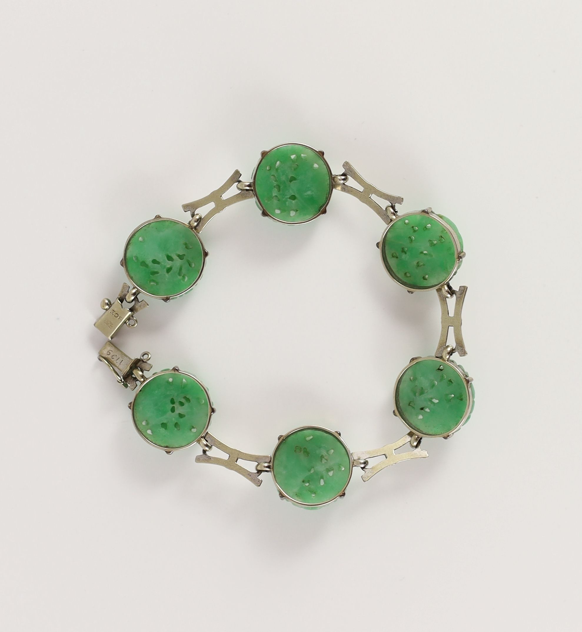 A mid 20th century 9ct white gold and jadeite set bracelet, in original Liberty & Co. fitted box